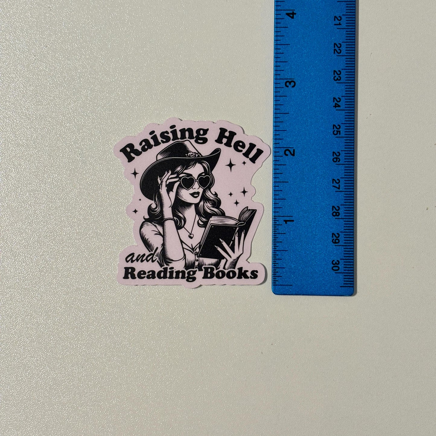 Raising Hell & Reading Books Sticker