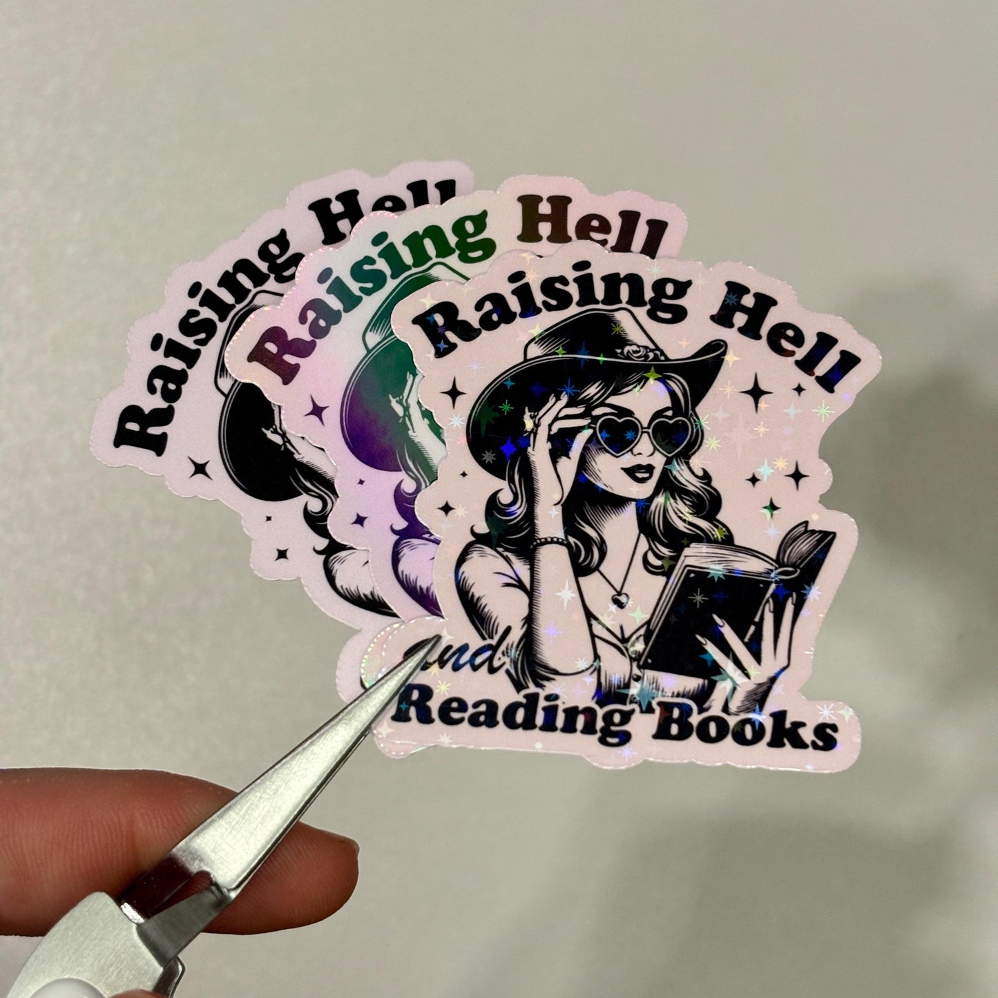 Raising Hell & Reading Books Sticker